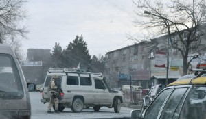 ISAF troops making an illegal U turn and menacing all Afghans around while