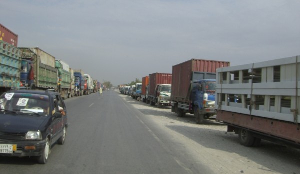 This was taken this morning after exiting the air port - yesterday's incident occured a good 250 meters to my front. These three retards - or Taliban suicide attack force - whatever; were detected by the ANP as they tried manuver to the gate through the parked trucks. No doubt the sight of 200 truck drivers running for their lives was a good tiup off. The Army and their private guard force helped out the ANP with a spirited volley or two but it is hard for me to see how they could have had clear lines of sight or fire. Unless the attackers ran out into the open field off to the left in this phot - people tend to do stupid things in a gunfight and maybe that is what these clowns did.