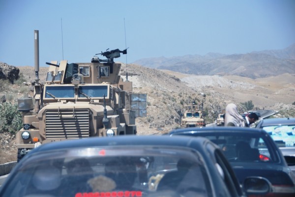 The Army had a four truck convoy stopped in the middle of the Jbad-Kabul Highway (Rt 1) but I saw no dismounts and have no idea what was up. They are just geting back in the road in this photo