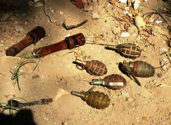 The "small swift" assailant took about 30 to the chest before he could get all of his stores deployed - these are 2 Chinese stick grenades, 3 Russian F1 hand grenades and 2 Pakistani handgrenades models P1 and MK 1. Typical collection of hand grenades available on the black market in Afghanistan