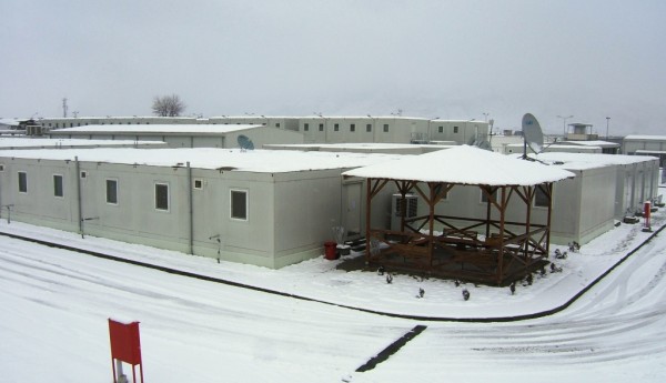 Camp Sully just before it opened. It looks like a big roomy place which it was compared to Camp Happy but looks are deceiving. The expat rooms had attached bathrooms which is good but the bathroom were almost as large as the sleeping area and wasted valuable space. The TCN barracks towards the rear of the picture did not have attached bathrooms and were therefore a little biggerthan the expat rooms. The project leadership lives in the closet building and those rooms - which had shared bathrooms - were pretty nice...but there are only 8 of them.