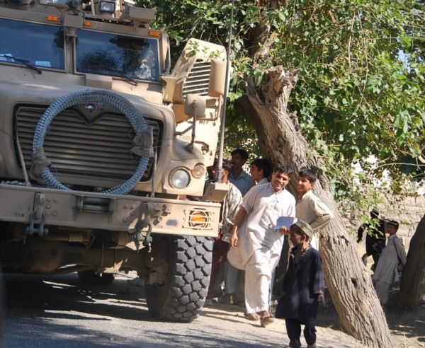 Look at the size of these stupid MRAP's. When the troops are inside them they have no ability to hear what is happening outside the vehicle and most of the occupant cannot see a damn thing from inside them. These vehicles isolate the people inside them completley from the outside world which makes them more, not less vulnerable to attack. Still it was good to see the Americans hanging out with the locals in a relaxed calm manner.....a little late for this mind you but still a positive sign