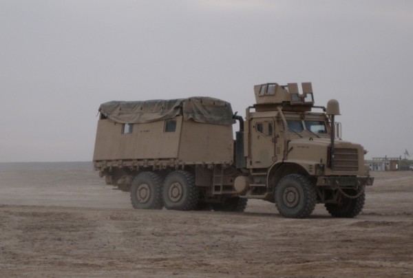 USMC 7 ton truck which are unique to the Marine Corps. It is a powerful truck which can travel off road with ease. It has a lot of ground clearnce which mitigates IED blasts because the power of IED's diminishes by some factor for every inch the blast must travel upwards from the point of detination. Amy or Keith from MIT probably know the formula but what I know is that the Marines have not lost anyone riding on these trucks to an IED. Better yet the back box can hold a squad plus of infantry who are primed to pour out of the thing and launch directly into the attack in good order. You just cannot do that when getting out of an MRAP nor can an MRAP carry that many men. This truck allows the Marines to do what they do best when ambushed - rapidly take the fight to the villains 