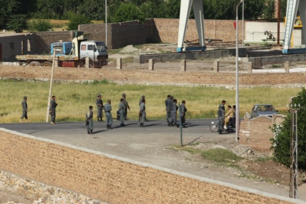 The ANP form a line - minutes before opening fire as the local mob surged towards them throwing rocks.  Phot by Michael Yon