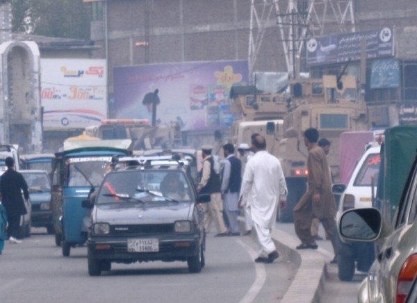 There is a large roomy truck by-pass which the Army can use to move around Jalalabad City. Moving through this densely packed urban area places everyone at risk unless the gunners are very familiar with the local traffic congestion and having swarms of local people moving around them. In this close urban terrain the ability to pick out a VBIED and successfully engage it are zero. Experienced troops will stay low in their gunners turrets in a relaxed, alert posture and stay away from the big machineguns mounted in them.