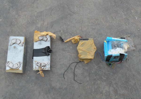 This is what local magnetic IED's look like.  They are big, obvious, not too powerful and it is hard to imagine that they were attached to the fule truck for very long without being spotted.   My guess is these things are being attached to the rear truck of these fule convoys at the customs station about 4 miles to the east.  