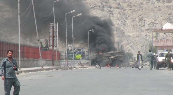 The VBIED blast ignited a large fire and reportedly killed the turret gunner who was ejected from the truck and thrown into the river. The ANP troops on the north side of the bridge reportedly reached the gunner mere moments after he hit the water rapidly getting him to shore where the medics could start working on him. I am glad the vehicle protected the rest of the crew but remain no fan of the MRAP. The 101st lost five men in one earlier today; for their size they offer state of the art protection which is meaningless when one of them hits a mine designed to kill a main battle tank. The fire department and police have pulled back from the MRAP as the ammo on board starts to cook off.