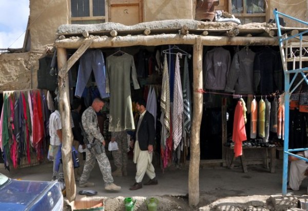 We should start seeing more of this.  In most of the country it is possible, and culturally advisable to move outside the FOB's without the body armor or helmets like this soldier was dpoing last week in Bamiyan. Our Friegn Service Officers could and shold be doing the same in places like Mazar and Herat but instead surround themselves with hire gun guys who have no experience with the local culture and are thus of little use