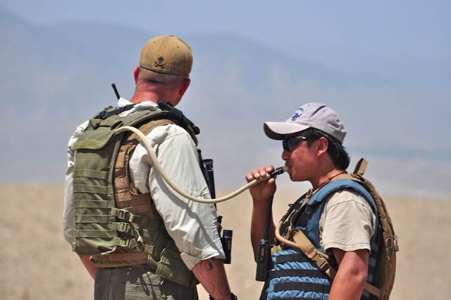 An ABP trainer and his terp duringa rnage shoot. These trainers are from Xe which was Balckwater and is now something else I think. There are several dozen guys on the contract with some embeded American Army troops and they have a large base at the Pachir Wa Agam distrcit center. Using large regional training centers has proven to be a bust for train Afgahan police. These guys from Xe are first rate working a top of the line contract for excellent pay. They would be much more effective if they were out and about with their charges instead of being restricted to a training base. 