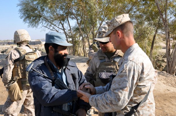 On the way back to base LtCol Ellison stops to present a battalion coin to an Afghan policeman telling him he earned it by always being at his post with his weapon and controlling his intersection like a professional which the Marines find "motivating". This is counterinsurgency 101 in action where small acts of recognition provide huge amounts of motivation