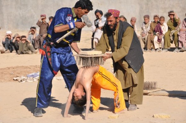 Then some father and son brick breaking on a bed on nails