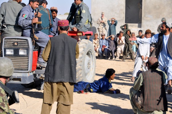 The show concluded with the classic "run over the Parwan with a tractor load of police trick