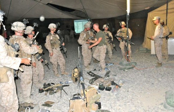 This night patrol brief started with all the Marines gear on the ground. They were then searched by their patrol leader and platoon sergeant. No ipods, tobacco lighters, matches, or any other no essential items are allowed and as every good Marine Sgt knows you inspect what you expect