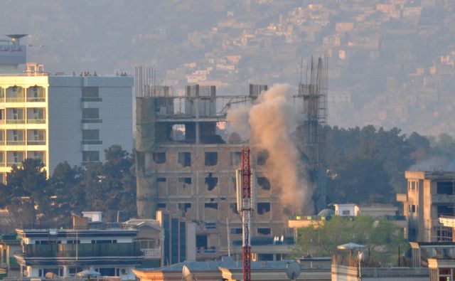 At dawn the villains were still active in the 3rd and 4th floors (counting top down). ANSF was hitting them with RPG's and rockets about every 45 seconds followed up with automatic weapons fire 