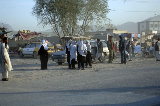 This is a picture from 2005 of kids waiting for their school bus on the corner of Jalalabad Road and the Green Village road. There are hundreds more children walking to schools along that road every morning now. At least one of those killed and many of the wounded today were school children.